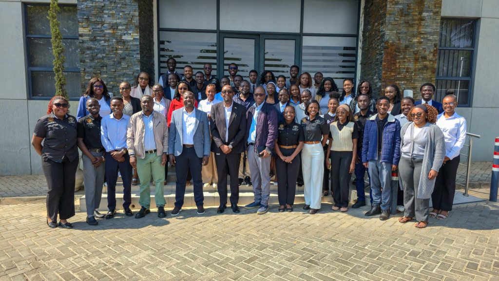 The UNZADESA delegation and IDC representatives pose for a group photograph at IDC Head Office.