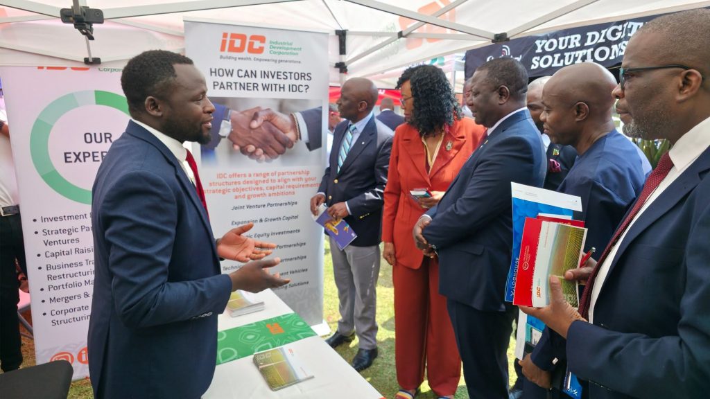 IDC representatives engaging conference participants at ZCMCA 2026