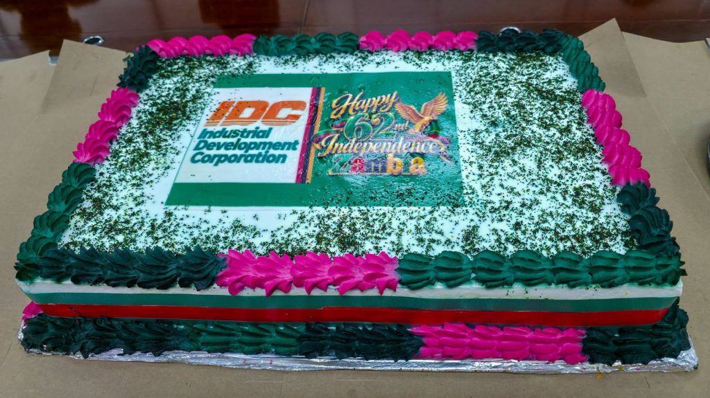 The IDC cake marking Zambia's 62nd Independence anniversary, decorated in green, red and black.