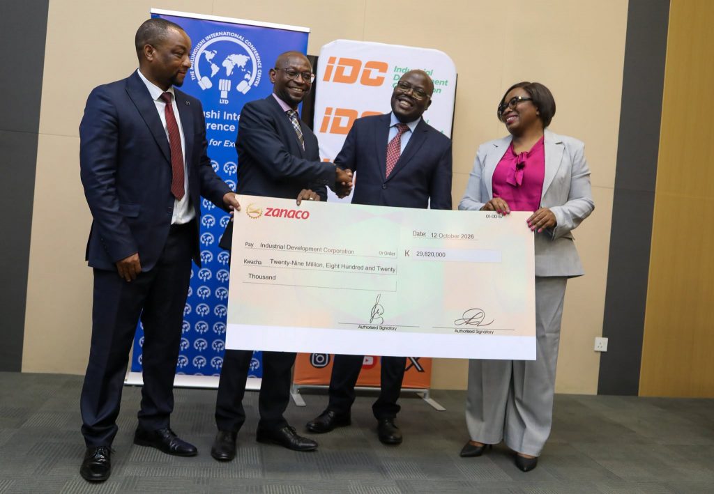 MICC and IDC representatives at the dividend cheque handover on 12 October 2026