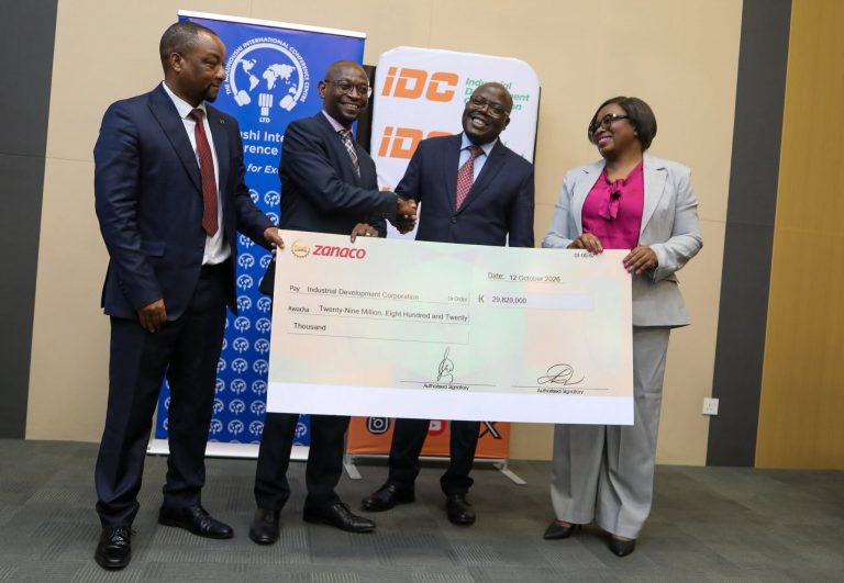 MICC and IDC representatives at the dividend cheque handover on 12 October 2026