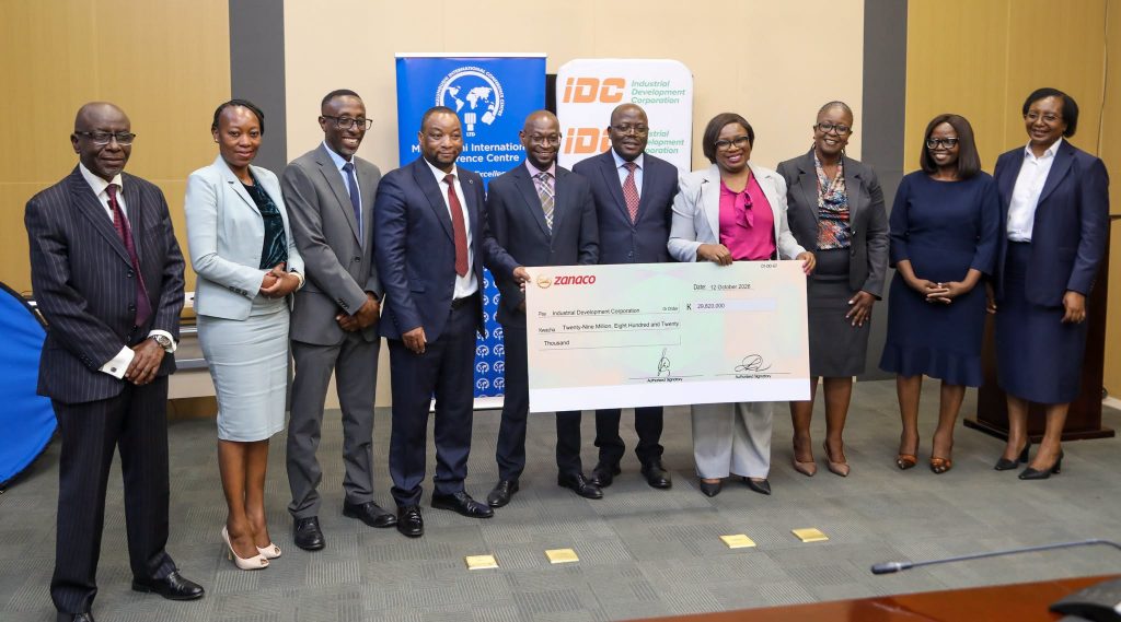 MICC and IDC representatives gather for a group photograph with the dividend cheque