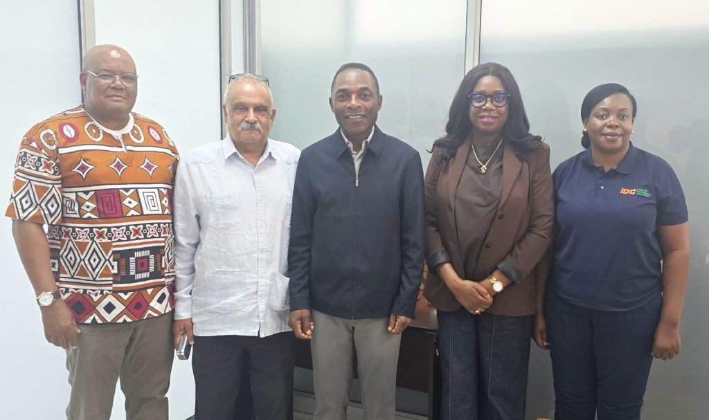 Mr. Cornwell Muleya stands with High Commissioner Saad Cachalia and members of both delegations after the courtesy call.