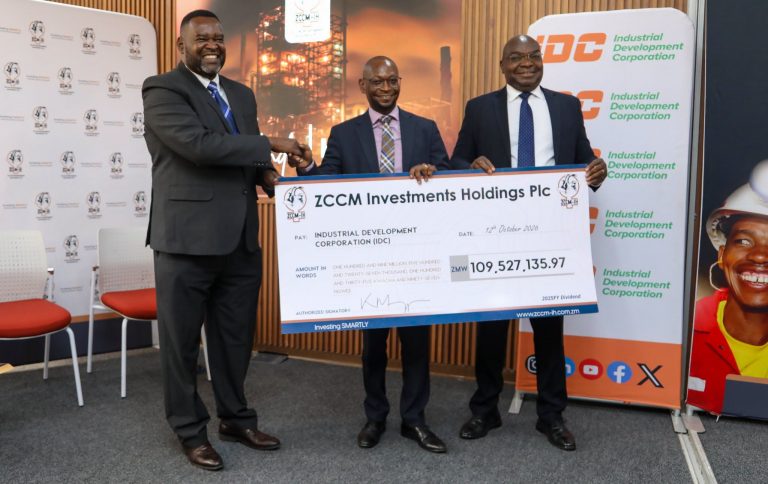 ZCCM-IH and IDC representatives present the dividend cheque to IDC