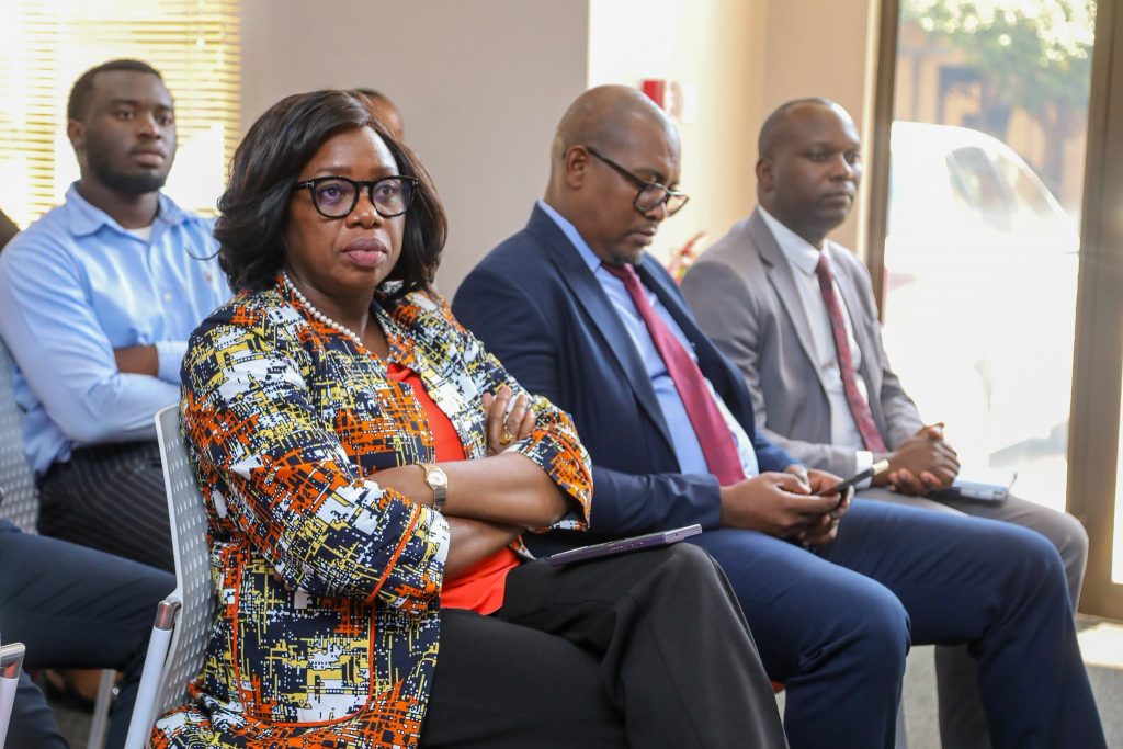 Attendees listen to remarks at the ZCCM-IH dividend handover ceremony