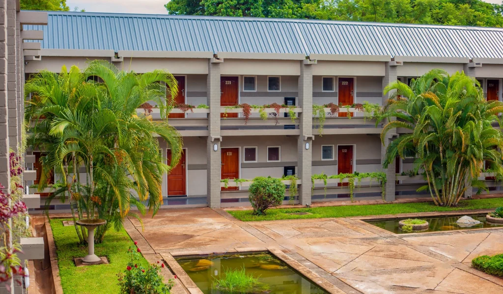 Mukuba Hotel accommodation buildings and landscaped courtyard in Ndola.